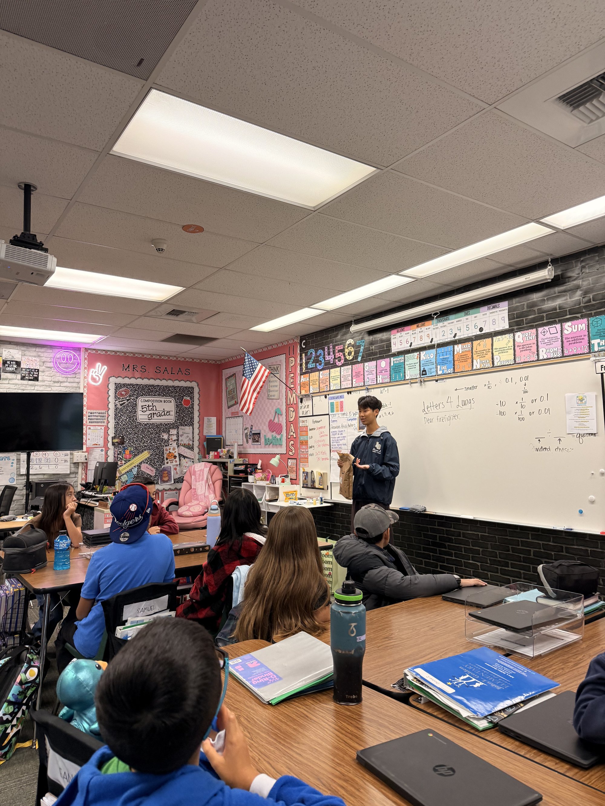 Project Pulmonary presentation in a classroom with a firefighter