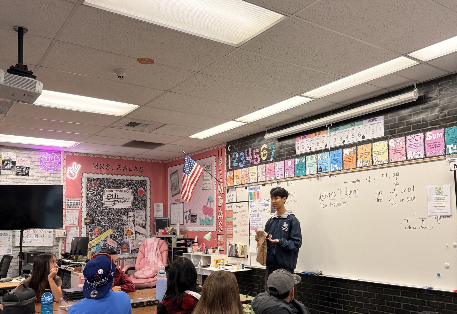 Student teaching a classroom about Project Pulmonary